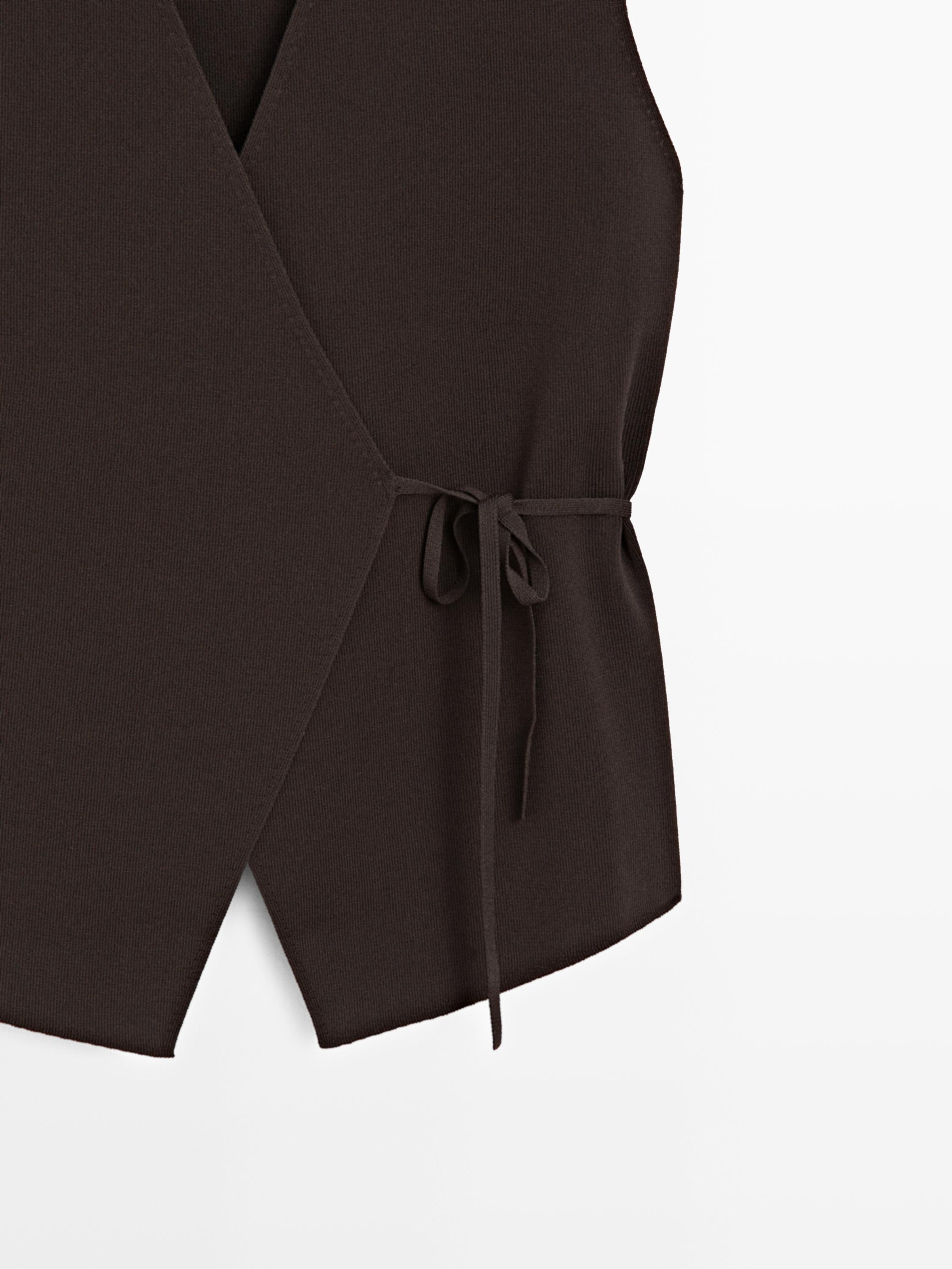 Crossover knit vest with tie detail